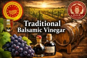 this is the image of traditional balsamic vinegar DOP with some wine yard and grapes